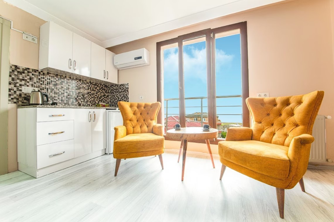 Junior Suit Oturma Alanlı Oda
